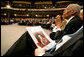 Guests listen to speakers at the homegoing celebration for Coretta Scott King, Tuesday, Feb. 7, 2006 at the New Birth Missionary Church in Atlanta, Ga., attended by President George W. Bush and Mrs. Laura Bush. White House photo by Eric Draper