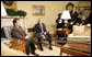 President George W. Bush listens as King Abdullah of Jordan makes remarks Wednesday, Feb. 8, 2006, during a photo opportunity in the Oval Office. The two leaders took the opportunity to urge an end to recent violence over caricatures of the Prophet Mohammed. White House photo by Eric Draper