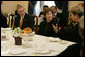 Mrs. Laura Bush listens as she participates in a briefing presented by the USUN Mission and World Food Program, Thursday, Feb. 9, 2006 in Rome, regarding hunger and AIDS issues. One of the purposes of the U.S. Mission to the UN agencies for Food and Agriculture is to draw attention to the global problems of hunger and food security. Ambassador Ronald Spogli, U.S. Ambassador to Italy, is seen at left. White House photo by Shealah Craighead