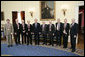 President George W. Bush and the Dr. John Marburger, far-right, director of the White House Office of Science and Technology, pose with the recipients of National Medal of Science, Monday, Feb. 13, of the White House. From left to right are Dr. Dennis P. Sullivan, Dr. Phillip A. Sharp, Dr. Robert N. Clayton, Dr. Stephen J. Lippard, Dr. Kenneth J. Arrow, Dr. Norman E. Borlaug, Dr. Edwin N. Lightfoot and Dr. Thomas E. Starzl. White House photo by Eric Draper