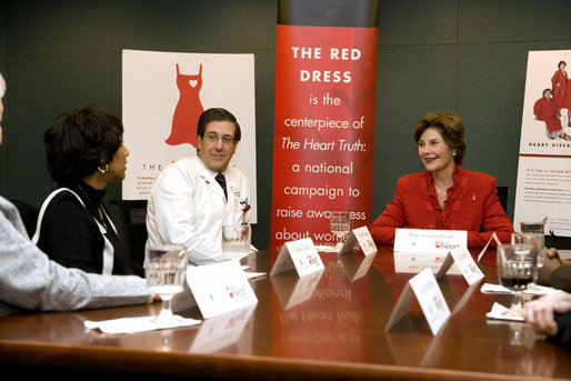 Laura Bush participates in a roundtable with Delphia Daniel, heart disease survivor, and Dr. Paul Colavita, Cardiologist, Sanger Clinic, at Carolinas Medical Center Wednesday, Feb. 15, 2006, in Charlotte, NC, to promote heart disease awareness, education and prevention. Heart disease is the leading cause of death of women in the US. White House photo by Shealah Craighead