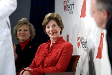 Laura Bush sits with Lois Ingland, a heart disease survivor, during an event at the Carolinas Medical Center Wednesday, Feb. 15, 2006, in Charlotte, NC. Despite having none of the risk factors of heart disease, Lois, a mother of four, suffered a heart attack when she was 36 years old. White House photo by Shealah Craighead