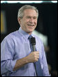 President George W. Bush interacts with the audience after delivering remarks on the global war on terror in Tampa, Fla., Friday, Feb. 17, 2006. White House photo by Eric Draper