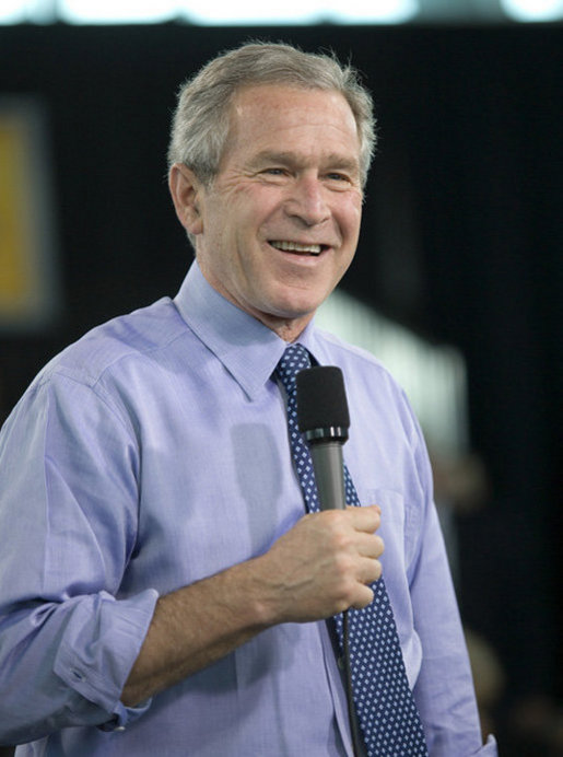 President George W. Bush interacts with the audience after delivering remarks on the global war on terror in Tampa, Fla., Friday, Feb. 17, 2006. White House photo by Eric Draper