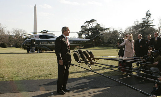 President George W. Bush talks wiith reporters on the South Lawn of the White House, Tuesday, Feb. 21, 2006, supporting the right of a United Arab Emirates business, following a thorough U.S. government review, to purchase the rights to manage six U.S. seaports. President Bush also emphasized that the security of the ports would continue to be managed by the U.S. Coast Guard and U.S. Customs. White House photo by Kimberlee Hewitt