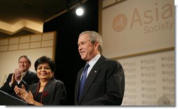 President George W. Bush is applauded as he is introduced to speak, Wednesday, Feb. 22, 2006 at the Asia Society meeting in Washington. President Bush talked about some of the issues he would address on his upcoming trip to India and Pakistan.  White House photo by Paul Morse