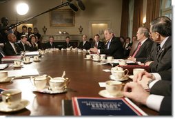 President George W. Bush answers reporters questions during a Cabinet meeting Thursday, Feb. 23, 2006 at the White House, where he condemned the destruction of the Golden Mosque in Iraq. White House photo by Eric Draper