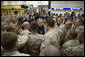 President George W. Bush meets with U.S. Marines headed to Iraq, during a stopover Tuesday evening, Feb. 28, 2006 at Shannon, Ireland's international airport terminal. President Bush visited with the Marines as part of his five-day visit to India and Pakistan. White House photo by Paul Morse