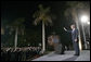 President George W. Bush waves as he leaves the stage Friday, March 3, 2006, after delivering remarks at Purana Qila in New Delhi before departing India for Pakistan. White House photo by Eric Draper