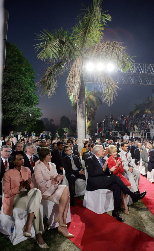 Laura Bush sits with Secretary of State Condoleezza Rice as they listen to President Bush's remarks Friday evening, March 3, 2006, in New Delhi. White House photo by Shealah Craighead