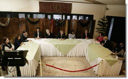 President George W. Bush meets with participants, Saturday, March 4, 2006 at the Roundtable with Pakistani Society Representatives at the U.S. Embassy in Islamabad, Pakistan.  White House photo by Eric Draper