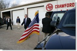 President George W. Bush leaves the Crawford Fire Station after voting in the Texas primary in Crawford, Texas, Tuesday, March 7, 2006. White House photo by Eric Draper