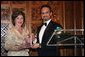 Mrs. Laura Bush is presented with an award by Kuwait Ambassador Al-Sabah, Tuesday evening, March 8, 2006 at the at "Bridges of Hope: Educating Children for a Better Future," The Kuwait-America Foundation's 2006 Benefit Dinner in Washington, in honor of her dedication to help improve the living conditions and education of children around the world. White House photo by Shealah Craighead