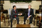 President George W. Bush welcomes Peru's President Alejandro Toledo to the Oval Office, Friday, March 10, 2006 at the White House. White House photo by Eric Draper