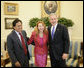 President George W. Bush welcomes Peru's President Alejandro Toledo and his wife, Eliane Karp de Toledo, to the Oval Office, Friday, March 10, 2006 at the White House. White House photo by Eric Draper