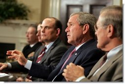 President George W. Bush speaks to the press after participating in a briefing by the Joint Improvised Explosive Device Defeat Task Force in the Roosevelt Room of the White House on Saturday March 11, 2006.  White House photo by Paul Morse