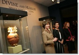 Mrs. Laura Bush, accompanied by Mrs. Marta Sahagun de Fox and Mrs. Eliane Karp de Toledo, talks with reporters following her tour of the Divine and Human: Women in Mexico and Peru Exhibit, Tuesday, March 14, 2006 at The National Museum of Women in the Arts in Washington.  White House photo by Shealah Craighead