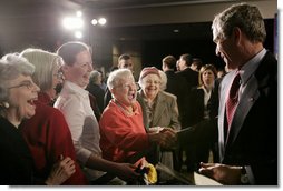 President George W. Bush meets with audience members following his remarks on the new Medicare Prescription Drug Benefit Program at the Riderwood Villiage retirement community, Wednesday, March 15, 2006 in Silver Spring, Md. President Bush urged seniors to get information about the new Medicare benefit program and sign up by the May 15th deadline.  White House photo by Paul Morse