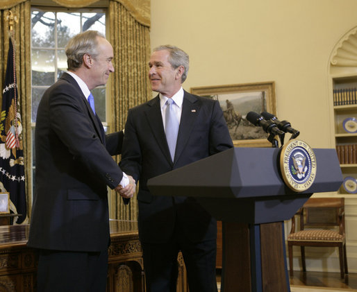 President George W. Bush and Idaho Gov. Dirk Kempthorne exchange handshakes in the Oval Office after the President announced Thursday, March 16, 2006, his intention to nominate the Governor to be Secretary of the Interior. White House photo by Paul Morse