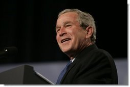 President George W. Bush reacts to a question from the audience at the Renaissance Cleveland Hotel in Cleveland, Ohio, while delivering his remarks on the global war on terror, Monday, March 20, 2006, to members of the City Club of Cleveland.  White House photo by Paul Morse