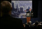 President George W. Bush answers a question from an audience member at the Renaissance Cleveland Hotel in Cleveland, Ohio, following his remarks on the global war on terror, Monday, March 20, 2006, to members of the City Club of Cleveland. White House photo by Paul Morse