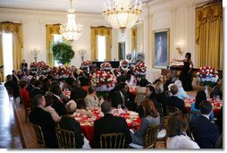 President George W. Bush and Mrs. Laura Bush join invited guests in listening to vocal star Denyce Graves at a White House social luncheon in honor of Liberia's President Ellen Johnson Sirleaf, Tuesday, March 21, 2006, at the White House.  White House photo by Shealah Craighead