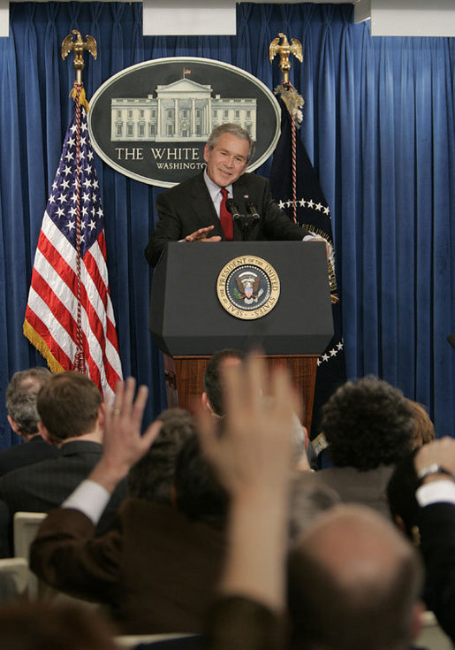 President George W. Bush answers reporters questions, Tuesday morning, March 21, 2006, during a news briefing at the White House. White House photo by Paul Morse