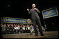 President George W. Bush gestures as he addresses his remarks on the global war on terror, Wednesday, March 22, 2006 at the Capitol Music Hall in Wheeling, W. Va. White House photo by Eric Draper