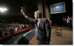 President George W. Bush waves as he leaves the Capitol Music Hall stage following his address on the global war on terror, Wednesday, March 22, 2006 in Wheeling, W. Va.  White House photo by Eric Draper