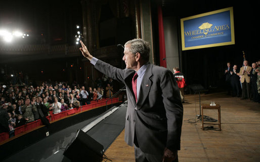 President George W. Bush waves as he leaves the Capitol Music Hall stage following his address on the global war on terror, Wednesday, March 22, 2006 in Wheeling, W. Va. White House photo by Eric Draper