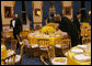 White House butlers place the finishing touches on table settings and decorations, Thursday evening, March 23, 2006 in the Blue Room of the White House, for a Social Dinner hosted by President George W. Bush and Mrs. Laura Bush in honor of the 300th Birthday of Benjamin Franklin. White House photo by Shealah Craighead