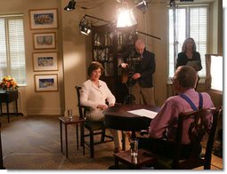 Mrs. Laura Bush talks about her involvement in the "Heart Truth" campaign with television interviewer Larry King, host of CNN's "Larry King Live," Friday, March 24, 2006 during an interview at the White House. The Heart Truth campaign, sponsored by the National Heart, Lung and Blood Institute, urges women to talk to their doctor about their risk for heart disease, and to take steps to lower that risk.  White House photo by Shealah Craighead