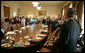 Secretary Andy Card is met by member applause Tuesday, March 28, 2006, as he enters the Cabinet Room moments after President George W. Bush announced the Chief of Staff's resignation. White House photo by David Bohrer