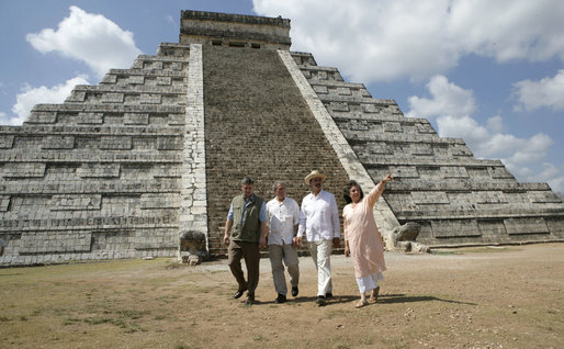 President George W. Bush is flanked by Canada's Prime Minister Stephen Harper, left, and Mexico's President Vicente Fox as they tour the Chichen-Itza Archaeological Ruins Thursday, March 30, 2006, with Dr. Federica Sodi, Regional Director of National Institute of Anthropology and History. White House photo by Eric Draper