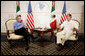 President George W. Bush meets with Mexican President Vicente Fox, Thursday, March 30, 2006, during their bilateral meeting in Cancun, Mexico. The meeting is part of a three-day summit with the leaders of Mexico and Canada. White House photo by Eric Draper