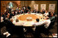 President George W. Bush, center, attends the Security and Prosperity Partnership meeting with Mexico's President Vicente Fox, right, and Canadian Prime Minister Stephen Harper, left, Friday, March 31, 2006 at the Fiesta Americana Condesa Cancun Hotel in Cancun, Mexico. White House photo by Eric Draper