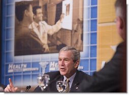 President George W. Bush emphasizes a point during a panel discussion on Health Savings Accounts Wednesday, April 5, 2006, at People's Bank Playhouse on the Green in Bridgeport, Conn. The President discussed how HSAs are giving Americans more control over their health care costs and decisions and are helping businesses make health care more affordable and accessible for employees.  White House photo by Paul Morse