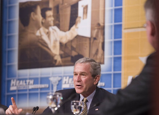 President George W. Bush emphasizes a point during a panel discussion on Health Savings Accounts Wednesday, April 5, 2006, at People's Bank Playhouse on the Green in Bridgeport, Conn. The President discussed how HSAs are giving Americans more control over their health care costs and decisions and are helping businesses make health care more affordable and accessible for employees. White House photo by Paul Morse