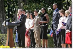 President George W. Bush congratulates the 2005 and 2006 NCAA Championship teams during a South Lawn ceremony Thursday, April 6, 2006. White House photo by Kimberlee Hewitt