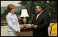 Mrs. Laura Bush enjoys a moment with Sal Tinajero Thursday, April 6, 2006, recipient of Hispanic Magazine's Teacher of the Year award in the Diplomatic Room at the White House. Along with being a World History teacher, Mr. Tinajero resurrected the Speech and Debate team at Fullerton Union High School in Santa Ana, California. White House photo by Shealah Craighead