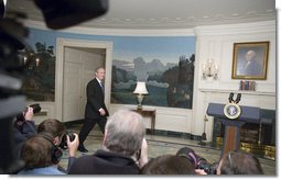 President George W. Bush walks into the Diplomatic Reception Room where he addressed the press Friday, April 7, 2006. "Good morning, This morning's economic report shows that America's growing economy added 211,000 jobs in the month of March," said the President. "The American economy has now added jobs for 31 months in a row, created more than 5.1 million new jobs for American workers. The unemployment rate is now down to 4.7 percent -- that's below the average rate of the 1960s, 1970s, 1980s and 1990s." White House photo by Kimberlee Hewitt