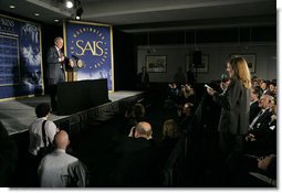 President George W. Bush takes questions from the audience after delivering remarks on the Global War on Terror at The Paul H. Nitze School of Advanced International Studies at The Johns Hopkins University in Washington, D.C., Monday, April 10, 2006. White House photo by Eric Draper