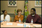 Mrs. Laura Bush listens to Jeremy Greathouse, an unemployed New Orleans youth, and LaToya Dorsha Williams, an Urban League participant, about difficulties of life experiences and employment during a discussion with the National Urban League in New Orleans, La., Monday, April 10, 2006. Urban League affiliate sites are providing youth care-focused employability skills, paid internships, and on-the job training to help participants enter full-time, private sector employment. White House photo by Shealah Craighead