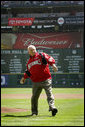 Vice President Dick Cheney winds up to throw the ceremonial first pitch at the Washington National's home opener against the New York Mets at RFK Memorial Stadium in Washington, Tuesday, April 11, 2006. The tradition of the president or vice president throwing out the ceremonial first pitch at a baseball game in Washington D.C. dates back to President Taft in 1910. The last vice president to throw the pitch was Vice President Humphrey in 1968. White House photo by David Bohrer