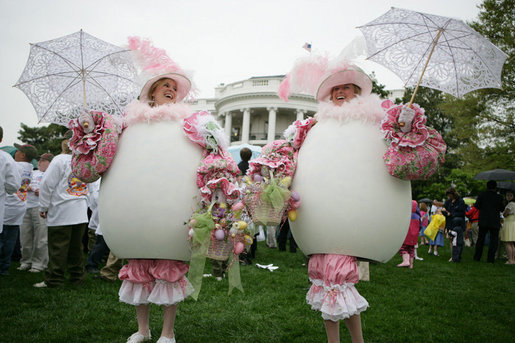 White House staff volunteers dressed in festive egg costumes stroll the South Lawn of the White House during the 2006 White House Easter Egg Roll, Monday, April 17, 2006. White House photo by Kimberlee Hewitt