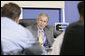 President George W. Bush talks with managers and staff at the Europa Stone Distributors, Inc. facility in Sterling, Va., during a roundtable discussion on taxes and the economy, following a tour of the company Monday, April 17, 2006. White House photo by Paul Morse