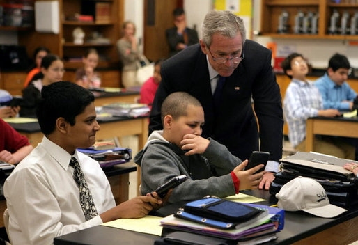 President George W. Bush visits with students at Parkland Magnet Middle School for Aerospace Technology in Rockville, Md., Tuesday, April 18, 2006. White House photo by Kimberlee Hewitt