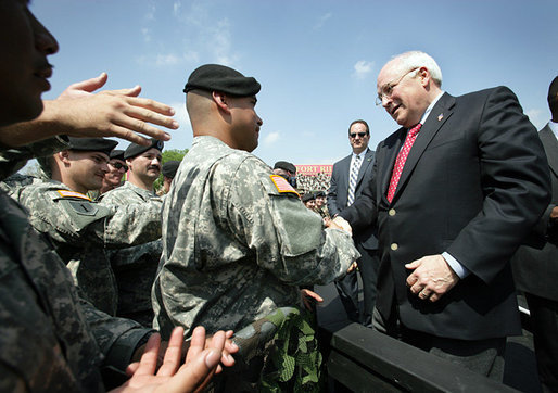 Vice President Dick Cheney greets soldiers at Fort Riley Army Base after delivering remarks at a rally for the troops, Tuesday, April 18, 2006. White House photo by David Bohrer