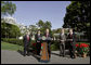 President George W. Bush talks to the press after visiting with four governors who visited Iraq, Afghanistan, and Kuwait on the South Lawn Wednesday, April 19, 2006. "I particularly want to thank them for going to see our men and women who are helping secure freedom and peace," said President Bush. "I thank them for sending a message from home that we care about them, we care about our troops, that we'll support our troops, that we appreciate the fact that people are willing to make sacrifices." White House photo by Eric Draper