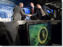 President George W. Bush greets state participants at the end of a Panel on the American Competitiveness Initiative at Cisco Systems, Inc in San Jose, California, Friday, April 21, 2006. White House photo by Eric Draper